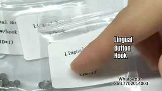 Lingual button with hook